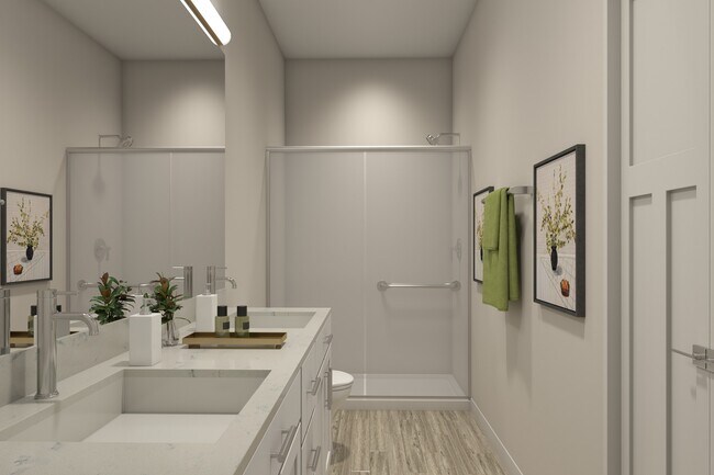 Apartamentos en Sugar Run, Delaware, Ohio, que muestran un baño con lavabo doble y ducha. - Flats at Sugar Run