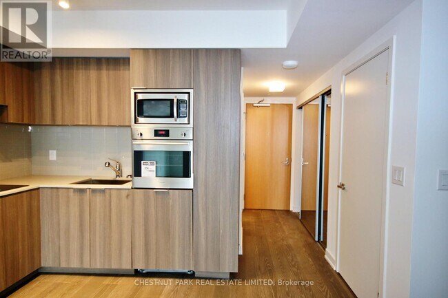 Building Photo - 11 Wellesley St W