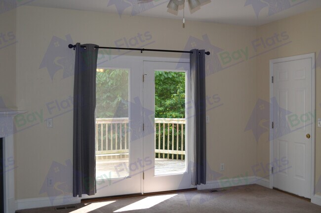 Living area with door. - 41195 Friendship Ct