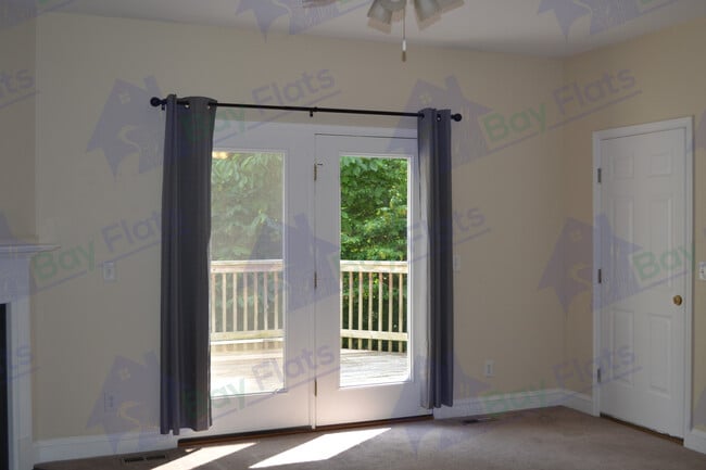 Living area with door. - 41195 Friendship Ct