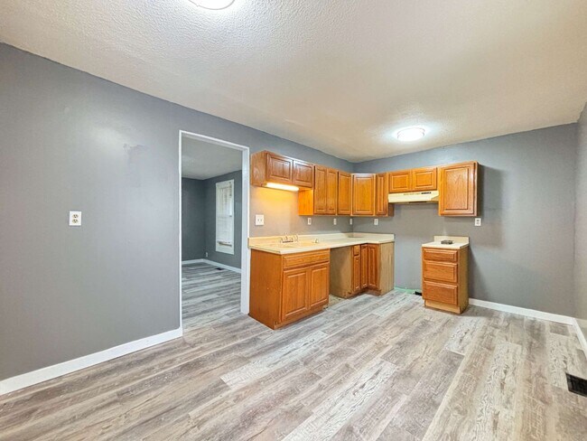 Building Photo - 3rd St Charm!