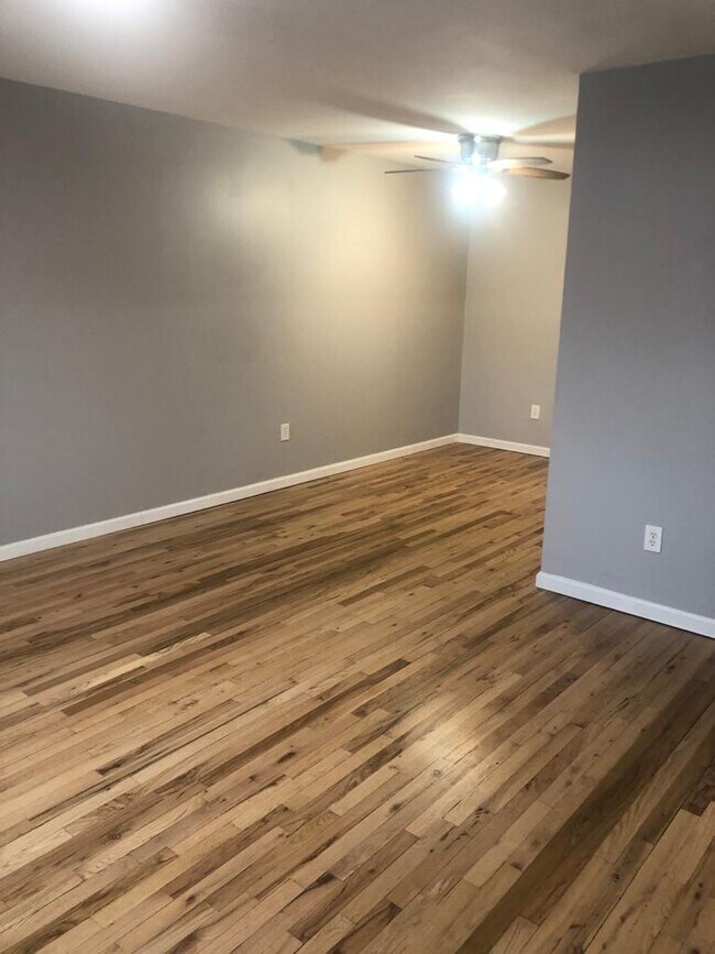 View of the open floor plan living room and dining room. - 2027 Linden Blvd