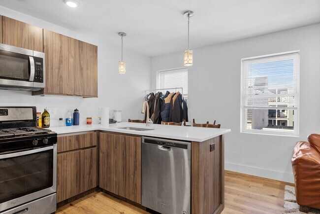 Foto del edificio - 211 W 9th St