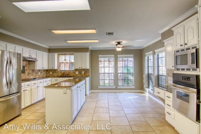 Building Photo - 4 br, 2.5 bath House - 7410 Bourget Dr