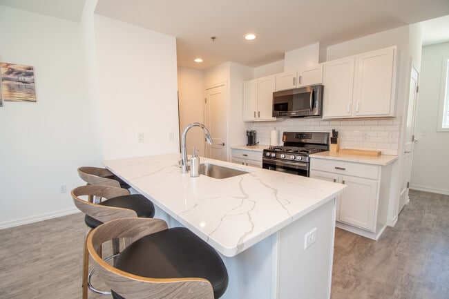 Kitchen - Live Well Apartments - Fully Furnished Units