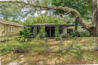 Building Photo - 10704 N Annette Ave