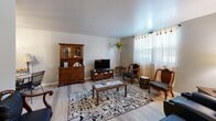 Located at 4224 W Central Ave in Toledo, Ohio, this one-bedroom, one-bathroom unit offers a well-organized single-floor layout that makes efficient use of its intimate footprint. The living room serves as the heart of the space, featuring light wood-style flooring, neutral walls, and windows dressed with sheer curtains that allow natural light to fill the room. The open arrangement accommodates multiple seating areas, making it a versatile and welcoming gathering space. A hallway connects the living area to the private quarters, providing a clear and functional flow throughout the unit. The kitchen features white cabinetry, granite-look countertops, a mosaic tile backsplash, and a double-basin sink — offering a clean and practical cooking environment. The bedroom is a comfortable retreat, highlighted by a ceiling fan with overhead lighting, a closet with bi-fold doors, and a window with curtains that invite natural light while maintaining privacy. Neutral-toned carpet and soft wall colors contribute to a calm and restful atmosphere. The thoughtful layout and consistent finishes throughout give this unit a cohesive, move-in-ready character suited for comfortable everyday living.