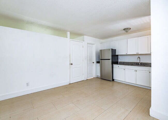 Foto del edificio - Bright & Modern 1-Bedroom Apartment in Pri...