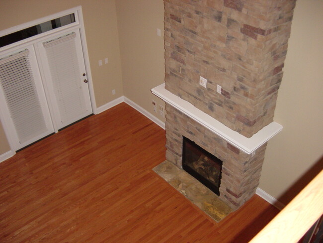 Great Room - tall ceiling, stacked stone fireplace - 6c Edge Ct