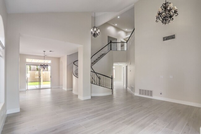 Building Photo - Luxury 5-Bedroom Home in Guard-Gated Community with 3-Car Garage