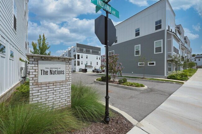 Building Photo - Brand-New Luxury Townhome in The Nations | Covered Deck & EV Charging