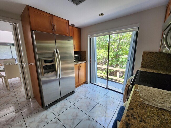 Building Photo - 201 Poinciana Island Drive Apt #101, Sunny...