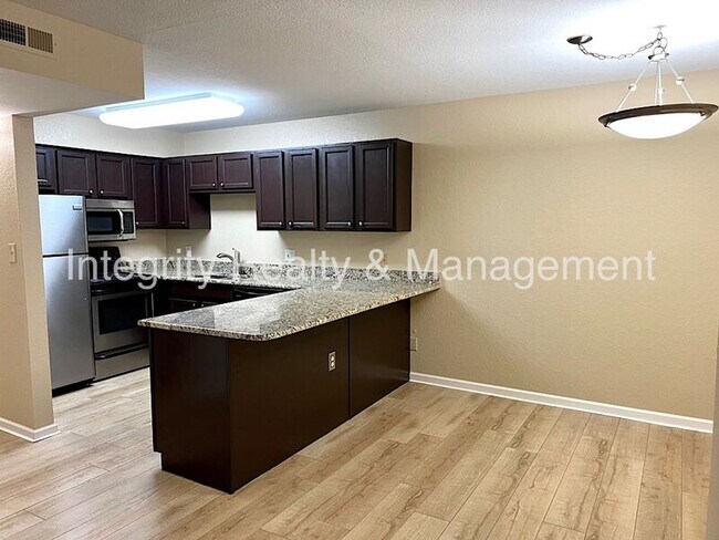 Building Photo - 13095 W Cedar Dr