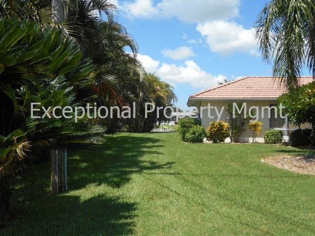 Photo - Spacious Home with Luxurious Primary Suite + Den on Oversized Gulf Access Lot!