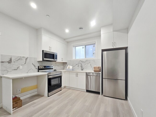 Building Photo - 6123-6133 33 Ave NW