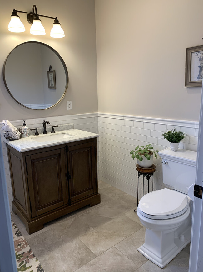 Gorgeous bath with tub / tiled floor and walls - 168 Island Pond Rd