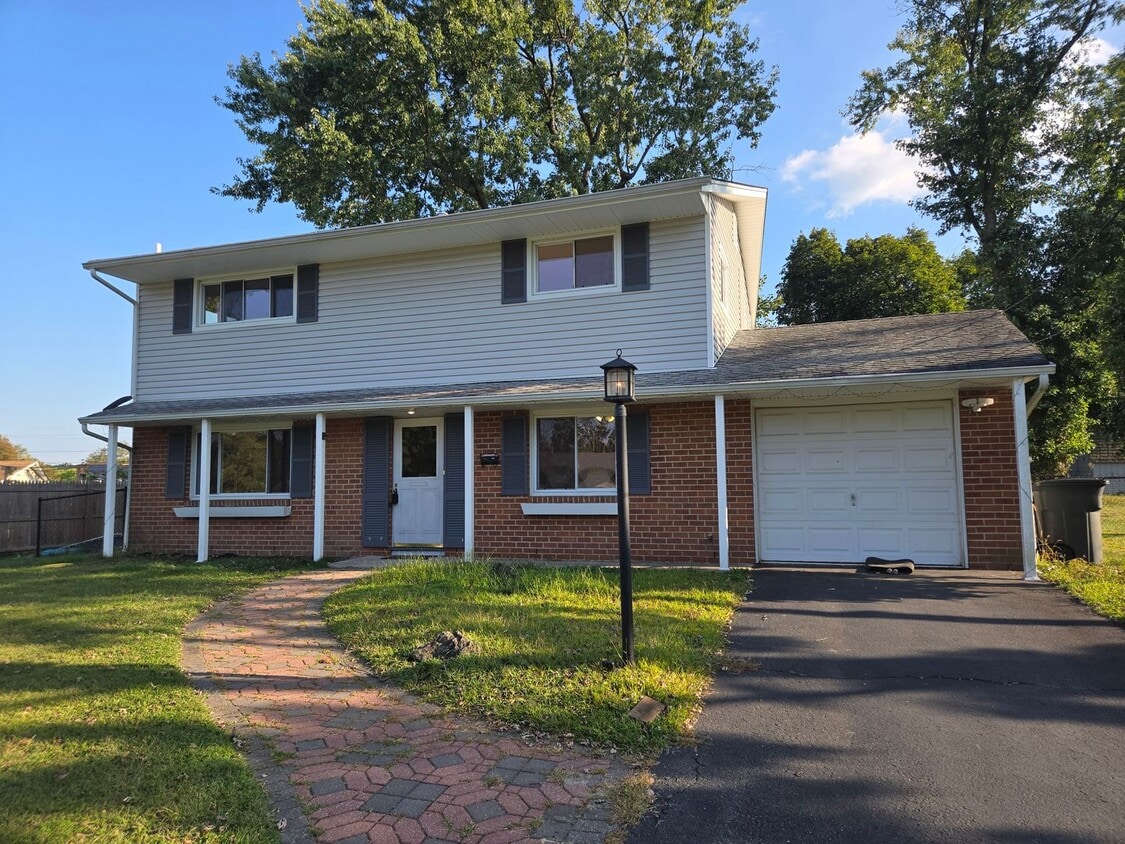 Primary Photo - Freshly painted throughout is this 4-bedro...