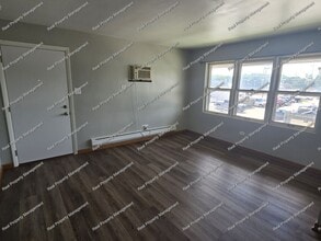 Building Photo - 8841 Schneider Ave