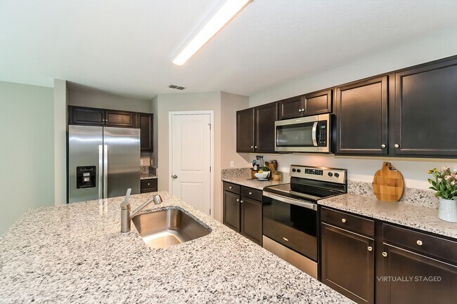 Foto del edificio - 9148 Udell Ln