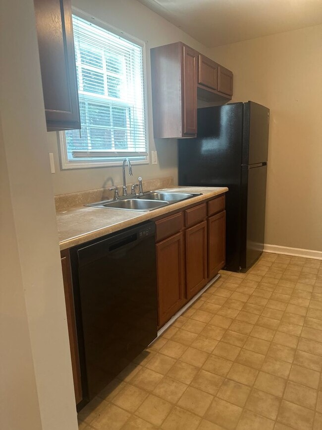 Building Photo - Welcome to this spacious 4-bedroom, 2.5-ba...