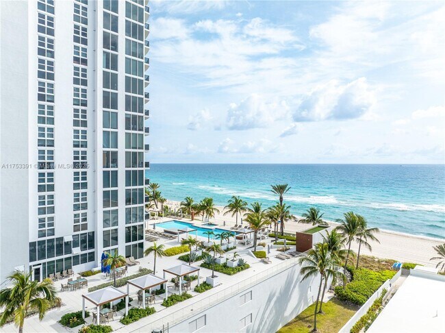 Building Photo - 18911 Collins Ave