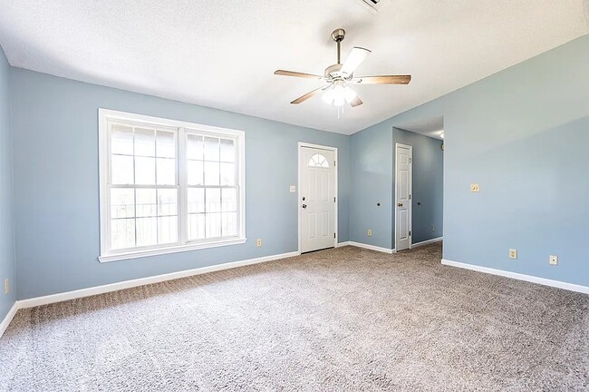 Living room view of front door - 1313 Montego Ct