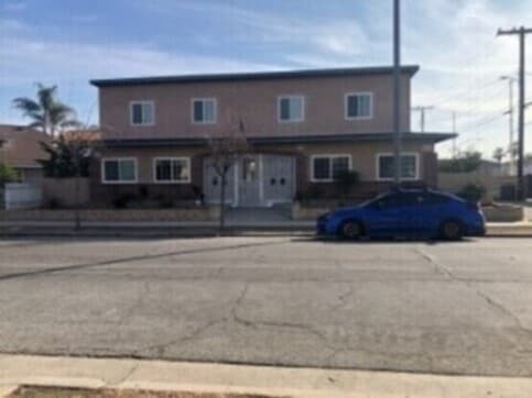 Front of Apartment Building - 240 E 6th St