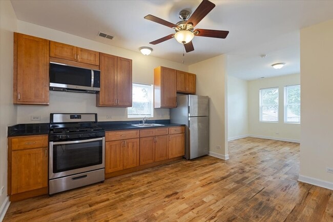 Building Photo - 1234 W 49th Pl
