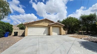 Building Photo - 65140 Blue Sky Cir