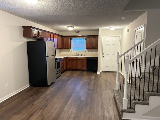 Building Photo - 3 Bed 2 Car Duplex in Grain Valley (New Flooring, Carpet, and Paint)