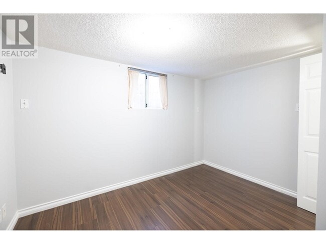 Building Photo - 153 W 64th Ave