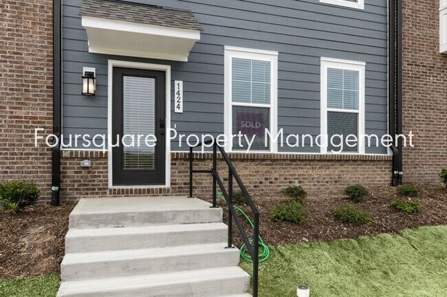 Building Photo - Spacious Townhome with Entry-Level Guest Suite, Washer/ Dryer Included, 2nd floor Balcony & 2-Car...