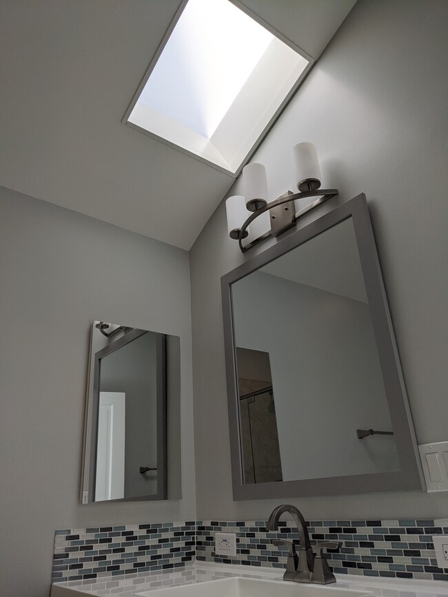 Master #2 bath skylight. - 7 Cove Road Place