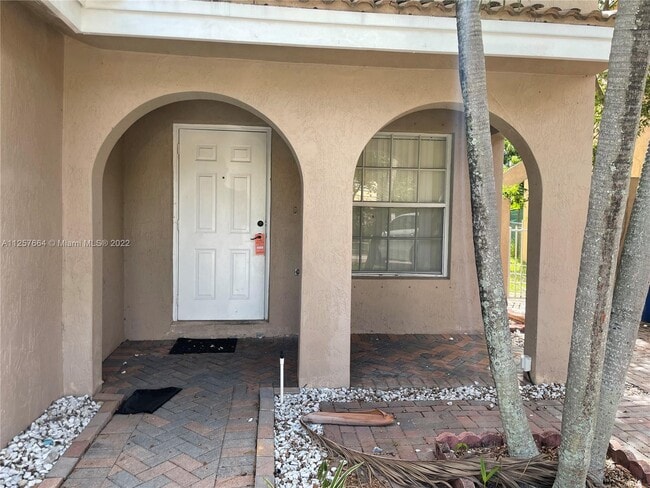 Building Photo - 5490 NW 92nd Ave