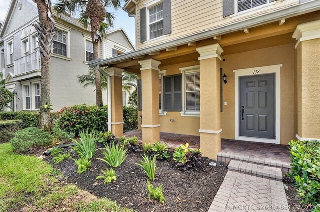 Building Photo - 158 W Thatch Palm Cir