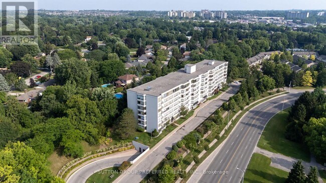 Photo du bâtiment - 521-521 Riverside Dr