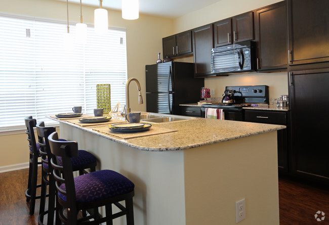 2br, 2ba- 1086 sf- Kitchen - SYNC at Harmony