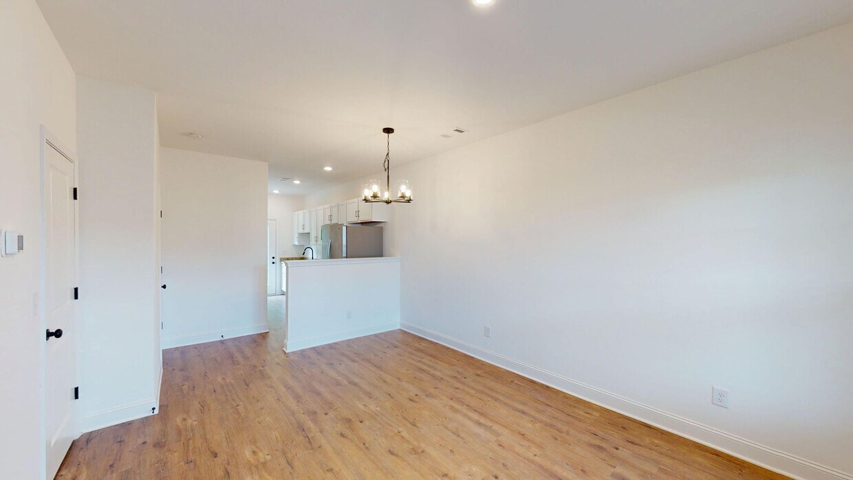 Primary Photo - Two Bedroom Townhomes With Flex Room at Th...
