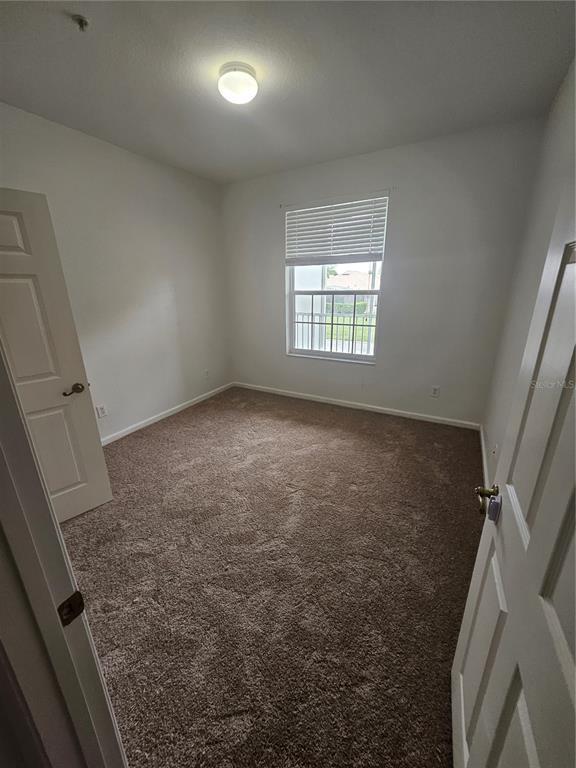 Building Photo - 2307 Butterfly Palm Way
