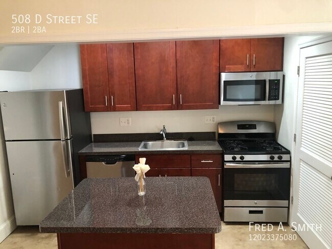 Building Photo - Townhouse In Capital Heights Available Now!