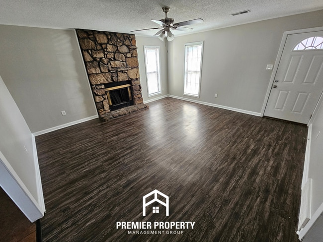 Photo - Charming 3BR/2BA Near Kirby | Hardwood Floors, Rustic Fireplace & Large Yard House