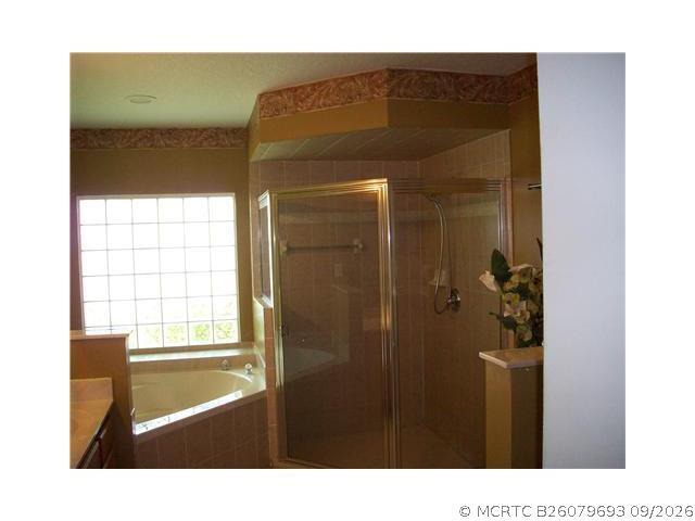 Foto del edificio - 6173 NW E Deville Cir