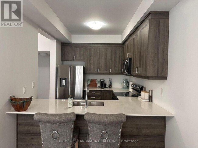 Photo du bâtiment - 575 Woodward Ave