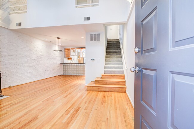 Building Photo - Updated 4-Level Rowhome with Rooftop Deck!