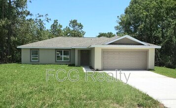 Building Photo - 9379 N Sandree Dr