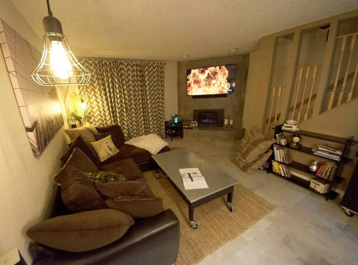 Living Room with 4K TV and Surround Sound - 9321 Arlene St