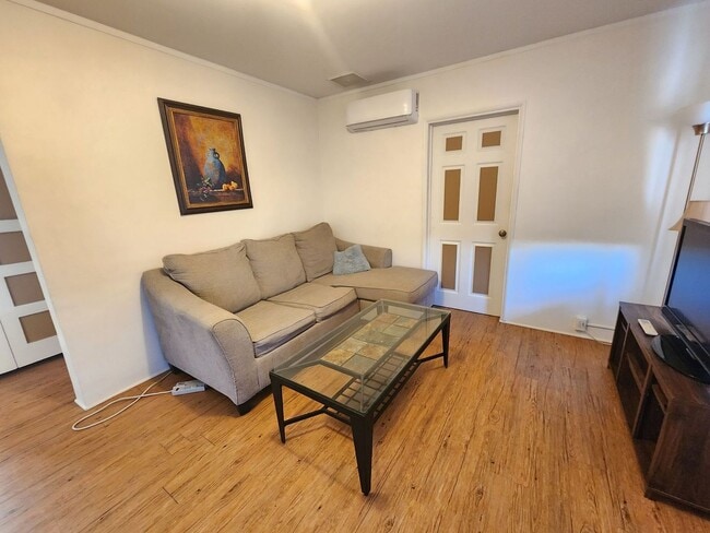 Building Photo - Coming Soon! Furnished One Bedroom with Bonus Room for Extra Space