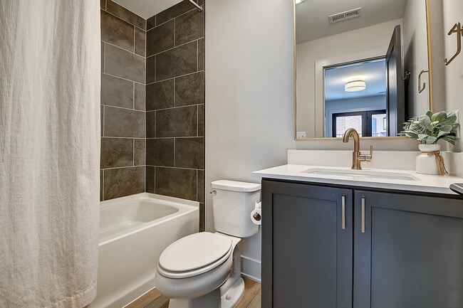 first floor bath - 721 E 16th St
