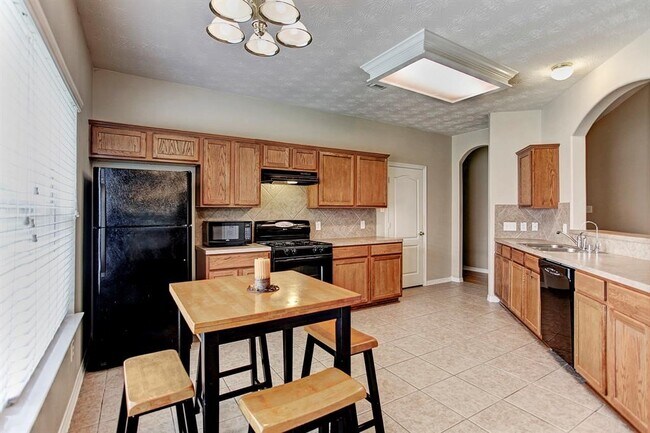 Foto del edificio - 9211 Hidden Lake E Dr