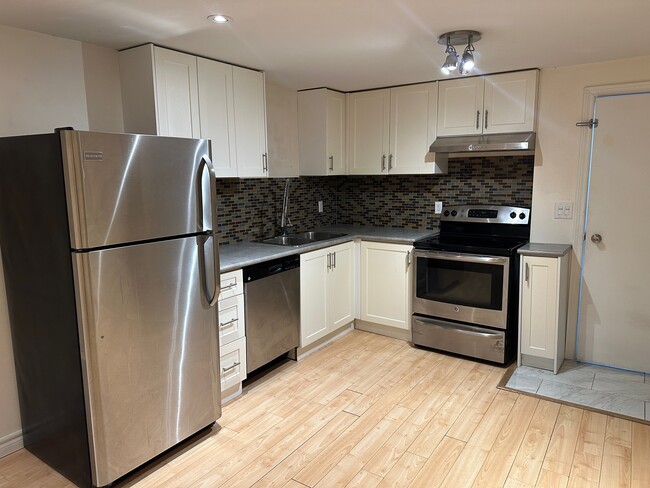 Building Photo - SPACIOUS 2-BEDROOM LEGAL BASEMENT APARTMEN...